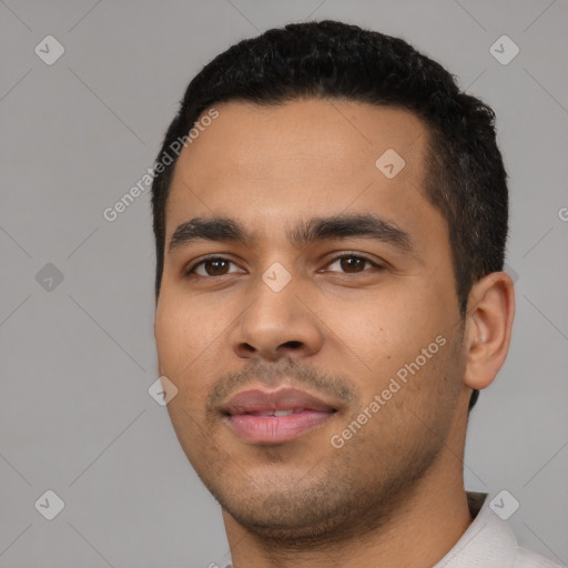 Neutral latino young-adult male with short  black hair and brown eyes