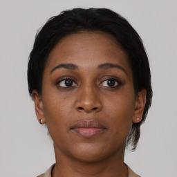 Neutral black young-adult female with short  brown hair and brown eyes