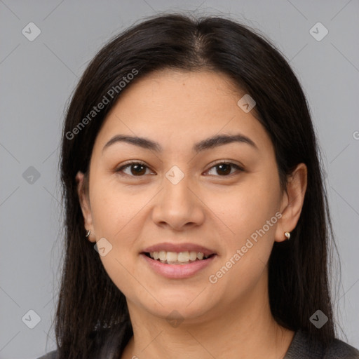 Joyful latino young-adult female with medium  brown hair and brown eyes