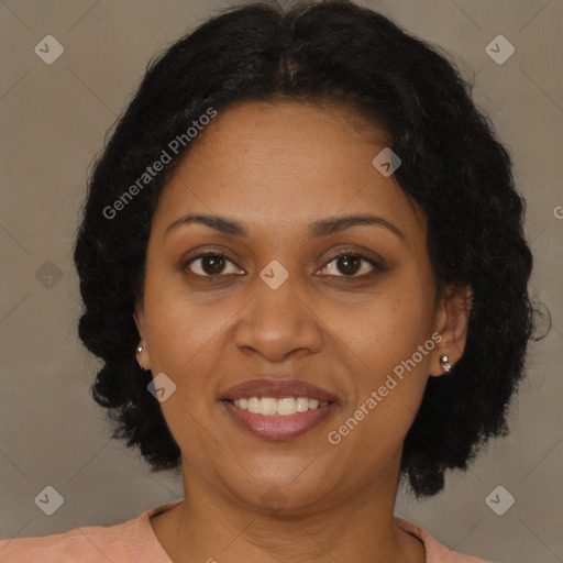 Joyful black young-adult female with medium  brown hair and brown eyes