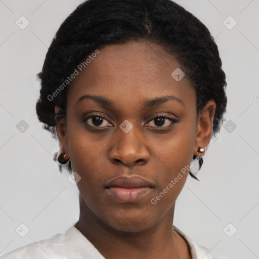 Neutral black young-adult female with short  black hair and brown eyes