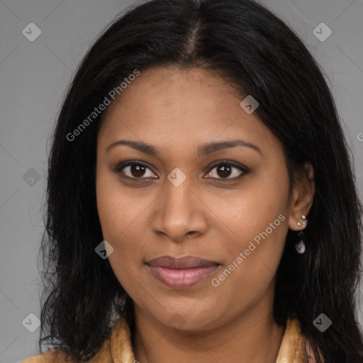 Joyful black young-adult female with long  brown hair and brown eyes