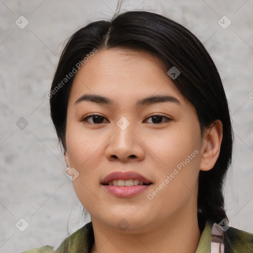 Joyful asian young-adult female with medium  black hair and brown eyes