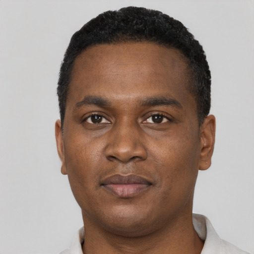 Neutral black young-adult male with short  brown hair and brown eyes