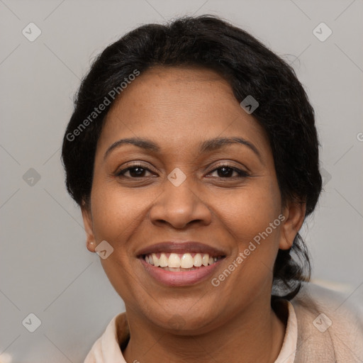 Joyful latino adult female with short  brown hair and brown eyes