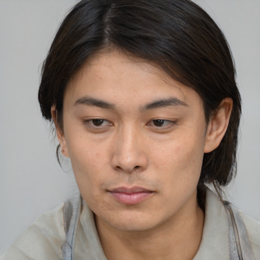 Neutral asian young-adult female with medium  brown hair and brown eyes