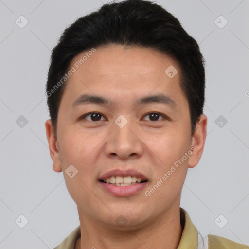 Joyful white young-adult male with short  black hair and brown eyes