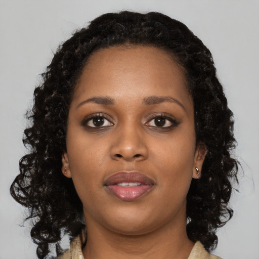 Neutral black young-adult female with long  black hair and brown eyes