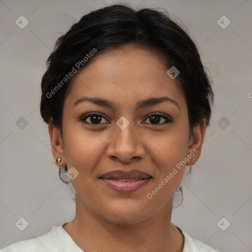 Joyful latino young-adult female with short  brown hair and brown eyes