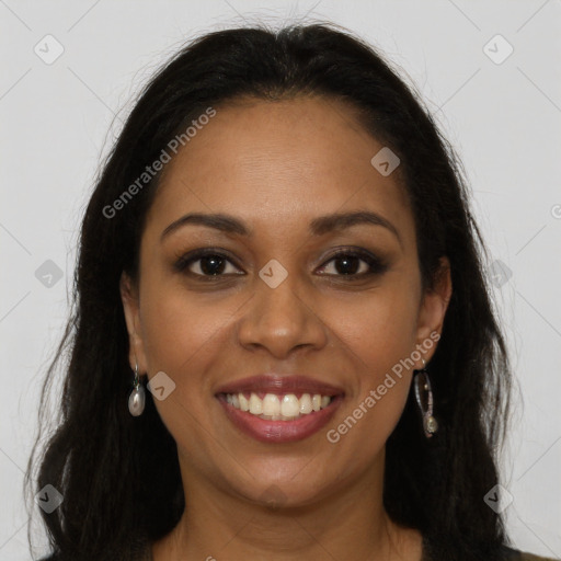 Joyful black young-adult female with long  brown hair and brown eyes