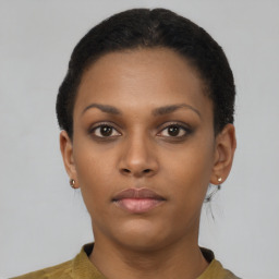 Neutral black young-adult female with short  brown hair and brown eyes