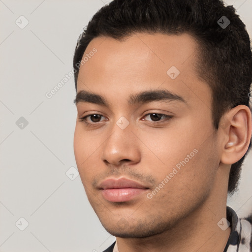 Neutral white young-adult male with short  black hair and brown eyes