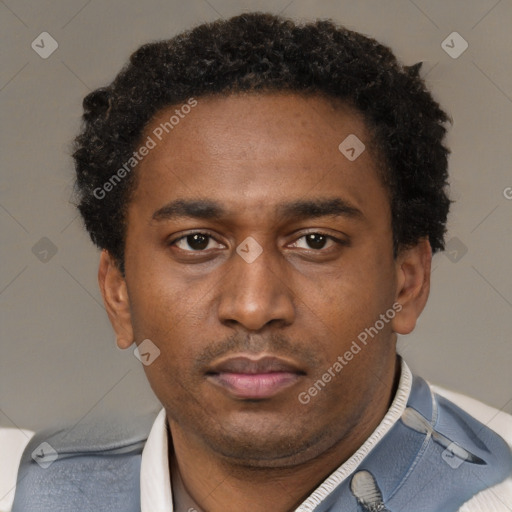 Neutral latino young-adult male with short  brown hair and brown eyes