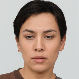 Neutral white young-adult female with short  brown hair and brown eyes