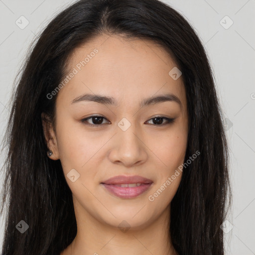 Joyful asian young-adult female with long  brown hair and brown eyes