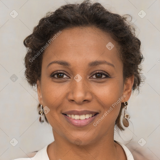 Joyful white adult female with short  brown hair and brown eyes