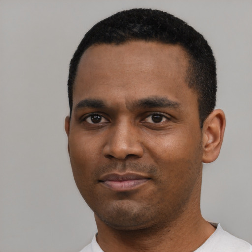 Neutral black young-adult male with short  black hair and brown eyes