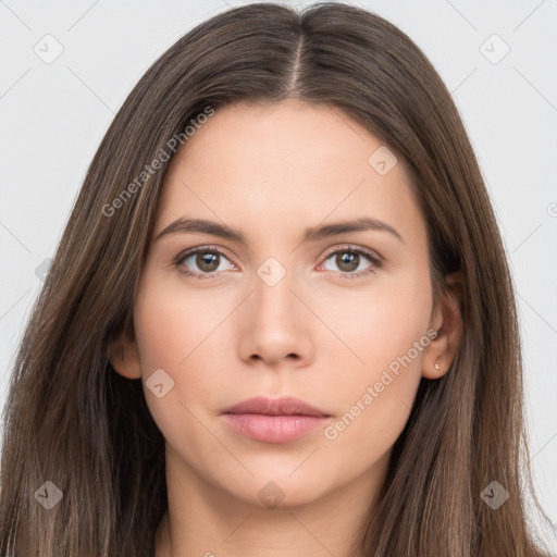 Neutral white young-adult female with long  brown hair and brown eyes