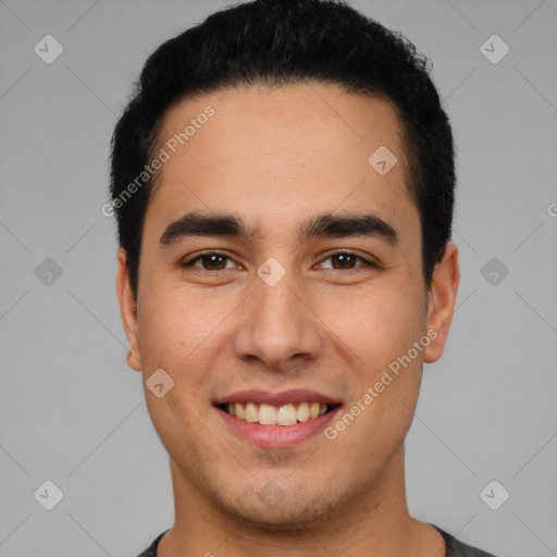 Joyful white young-adult male with short  black hair and brown eyes