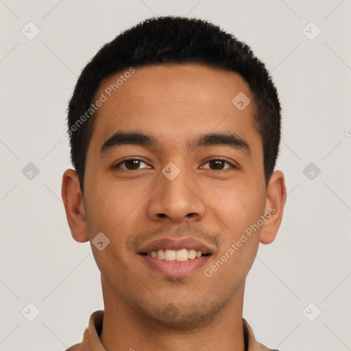 Joyful latino young-adult male with short  black hair and brown eyes