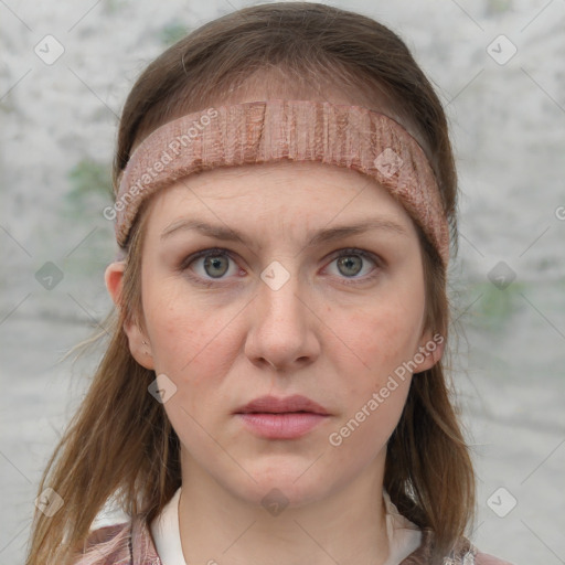 Neutral white young-adult female with medium  brown hair and grey eyes