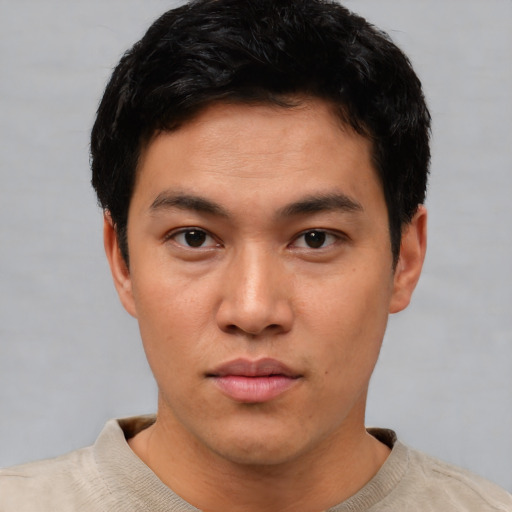 Neutral asian young-adult male with short  black hair and brown eyes