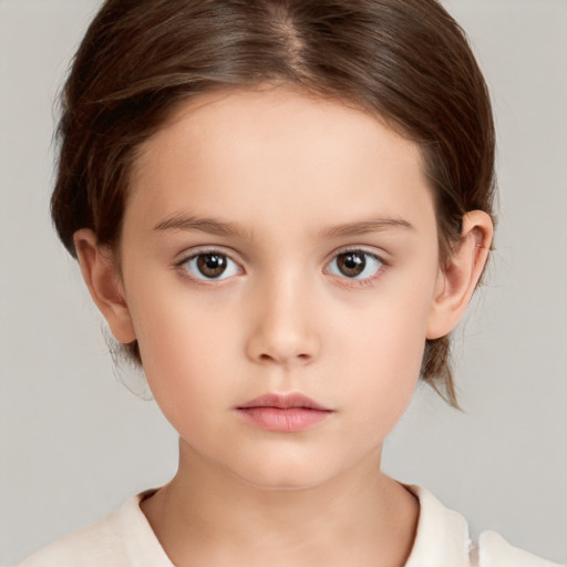 Neutral white child female with short  brown hair and brown eyes