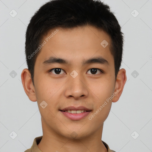 Joyful asian young-adult male with short  brown hair and brown eyes