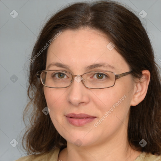 Joyful white adult female with medium  brown hair and brown eyes