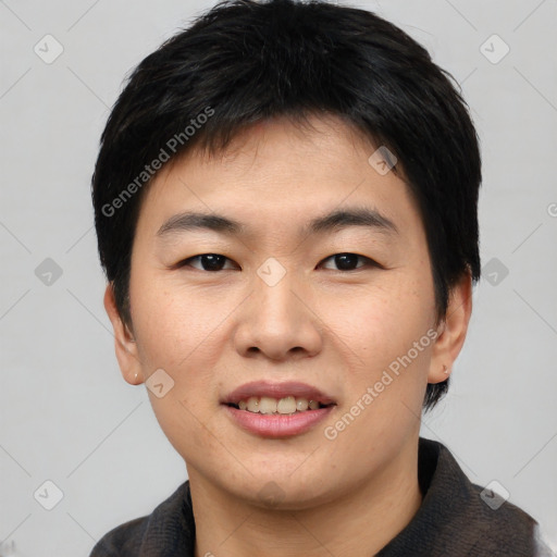 Joyful asian young-adult male with short  black hair and brown eyes