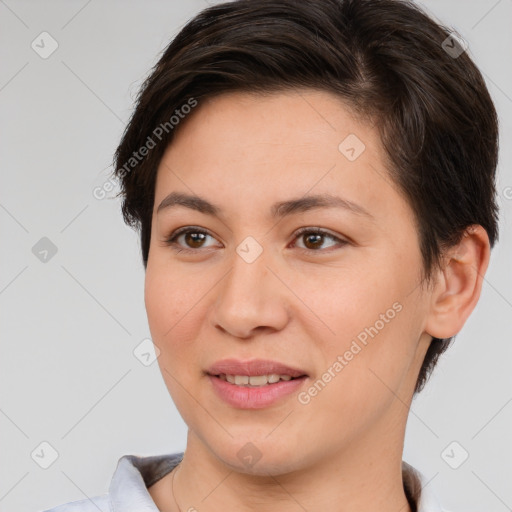 Joyful white young-adult female with short  brown hair and brown eyes