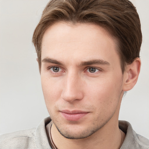 Neutral white young-adult male with short  brown hair and grey eyes