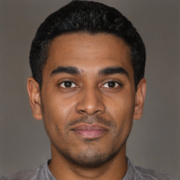 Neutral latino young-adult male with short  black hair and brown eyes