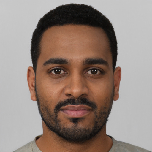 Neutral black young-adult male with short  black hair and brown eyes