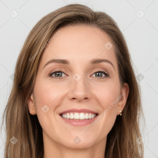 Joyful white young-adult female with long  brown hair and grey eyes