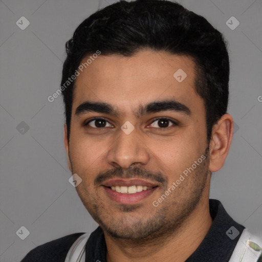 Joyful latino young-adult male with short  black hair and brown eyes