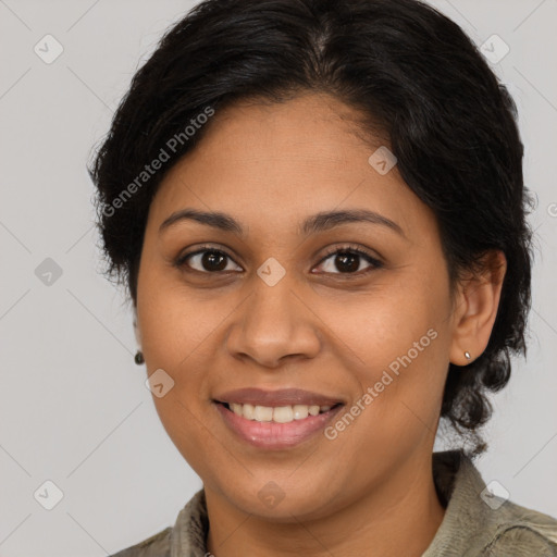 Joyful latino young-adult female with medium  brown hair and brown eyes