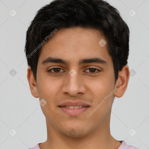 Joyful latino young-adult male with short  brown hair and brown eyes