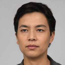 Neutral asian young-adult male with short  black hair and brown eyes