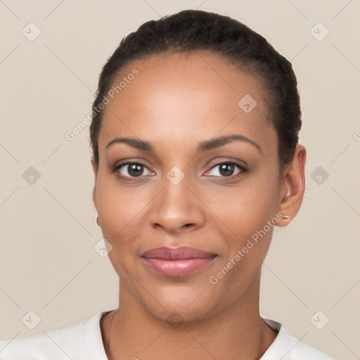 Joyful white young-adult female with short  black hair and brown eyes