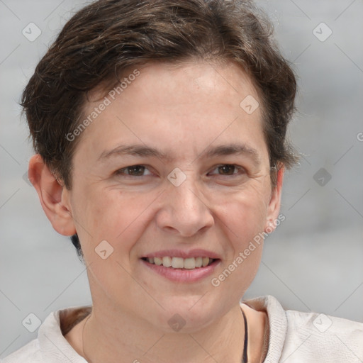 Joyful white adult female with short  brown hair and grey eyes