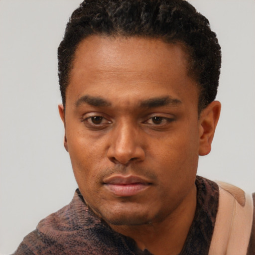 Neutral black young-adult male with short  black hair and brown eyes