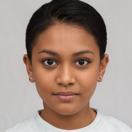 Joyful latino young-adult female with short  brown hair and brown eyes