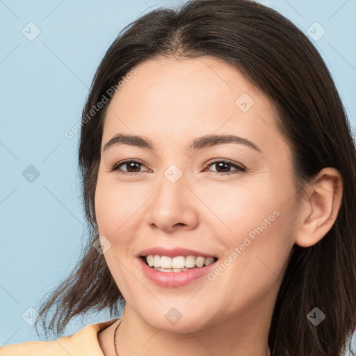 Joyful white young-adult female with long  brown hair and brown eyes