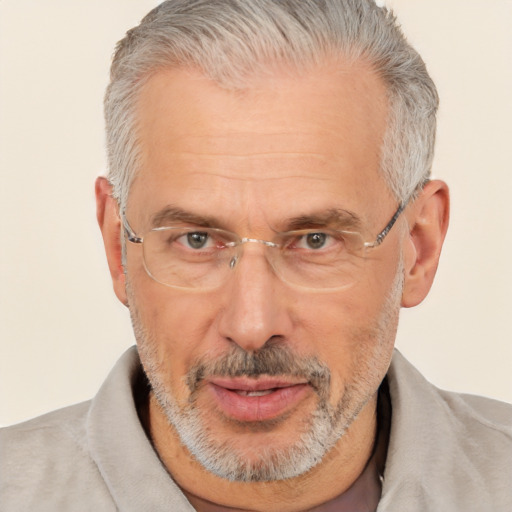 Joyful white middle-aged male with short  gray hair and brown eyes