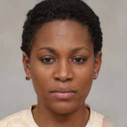 Neutral black young-adult female with short  brown hair and brown eyes