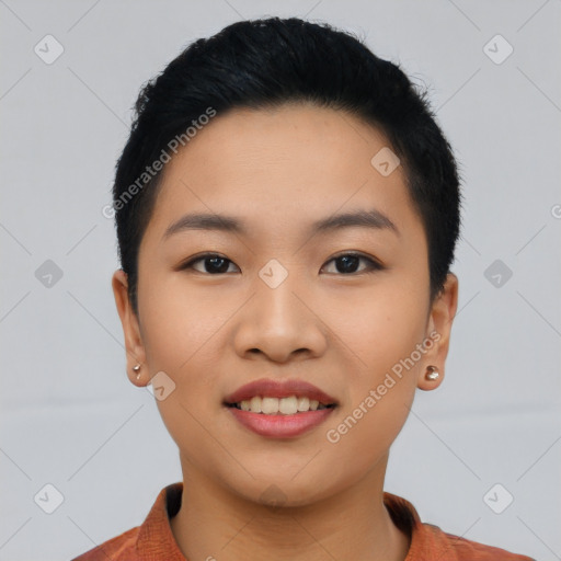 Joyful asian young-adult female with short  black hair and brown eyes