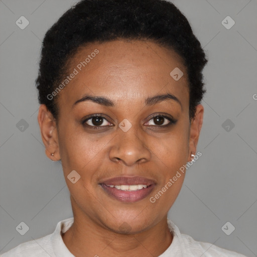 Joyful black young-adult female with short  brown hair and brown eyes