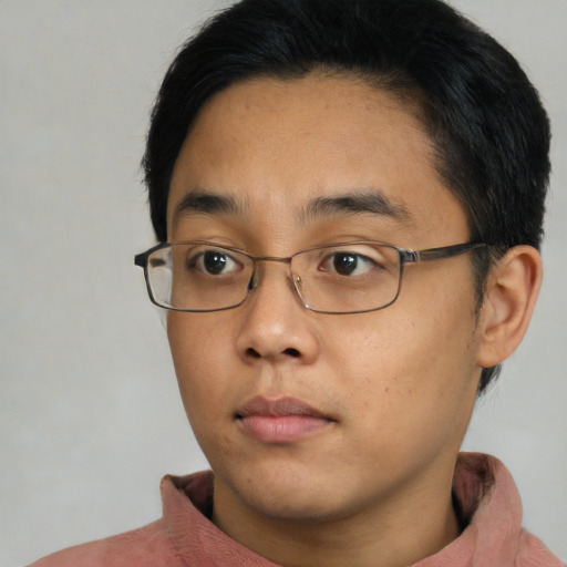 Neutral asian young-adult male with short  brown hair and brown eyes