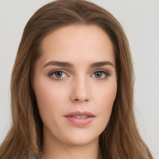 Neutral white young-adult female with long  brown hair and brown eyes